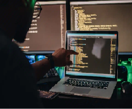 image of computer with Html coding on the screen